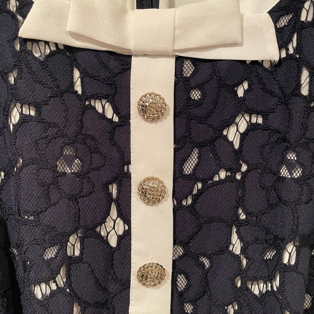 Navy Lace dresswith White Trim and crystal Buttons
